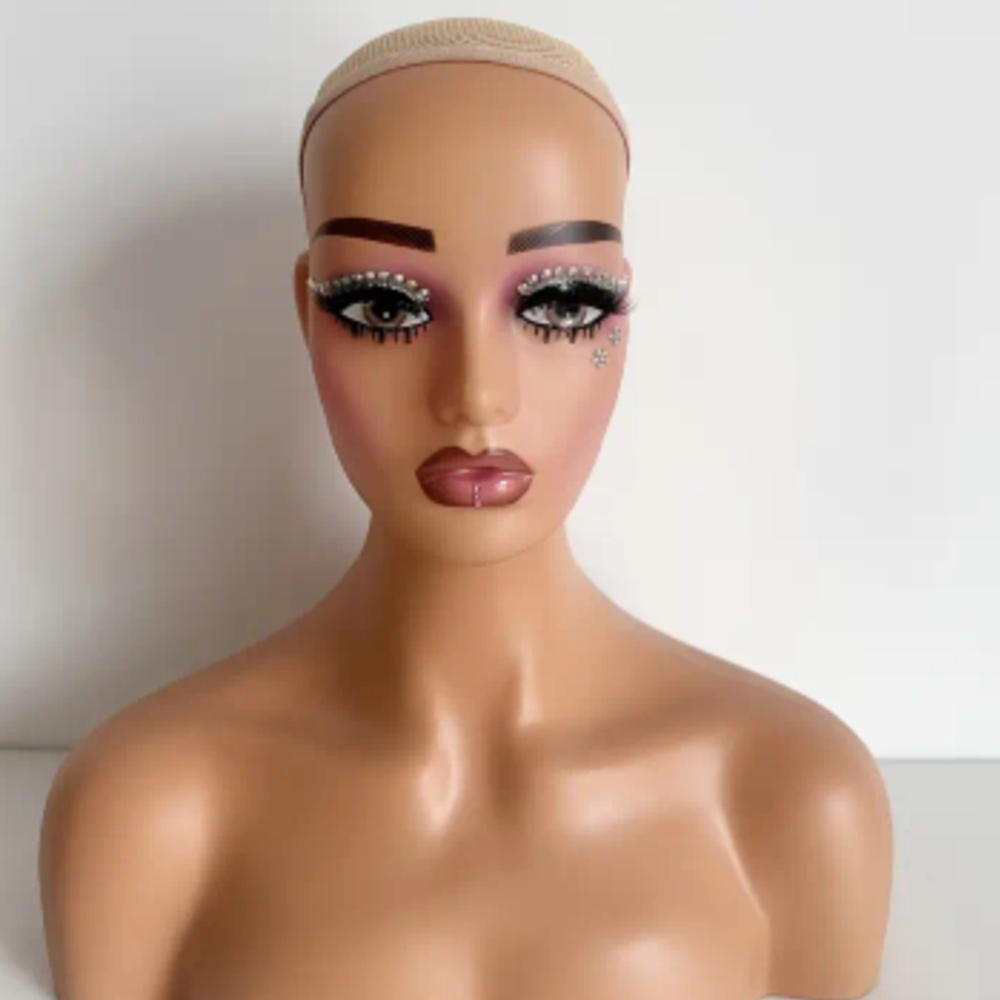 Elegant Makeup Mannequin Head with Pink and Brown Tones